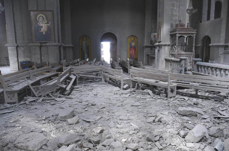 An interior view of the Ghazanchetsots (Holy Saviour) Cathedral in the city of Shusha, some 15 kilometers from the Nagorno-Karabakh province's capital Stepanakert, Thursday, Oct. 8, 2020. The church was damaged from shelling by Azerbaijani artillery. Armenia accused Azerbaijan of firing missiles into the capital of the separatist territory of Nagorno-Karabakh, while Azerbaijan said several of its towns and its second-largest city were attacked. (David Ghahramanyan/NKR InfoCenter PAN Photo via AP)