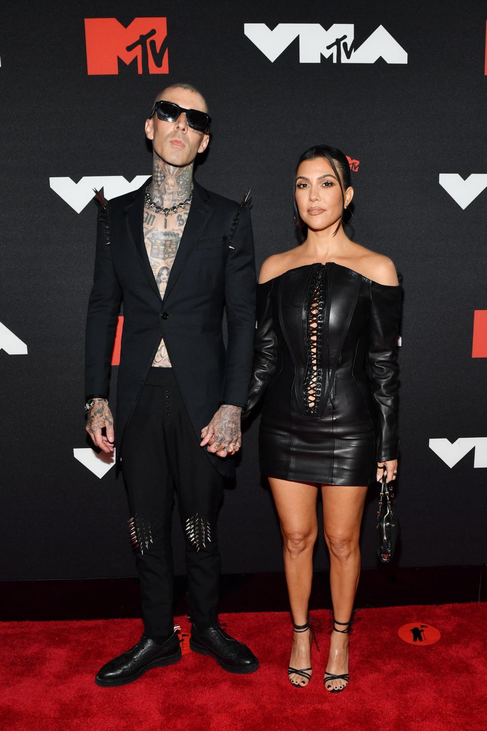 Travis Barker and Kourtney Kardashian.