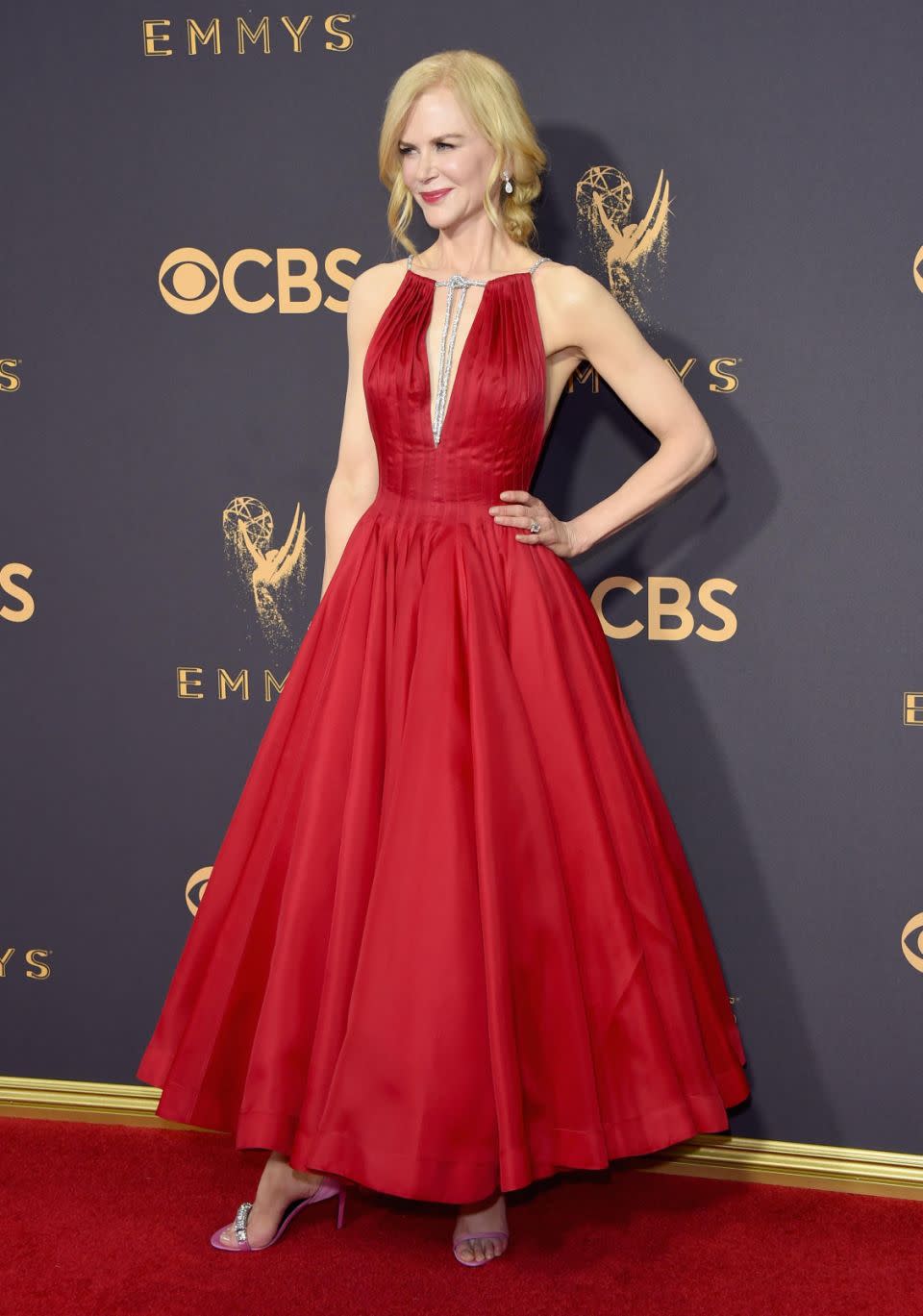 Nicole looked stunning a plunging red gown as she attended this year's Emmy Awards. Source: Getty