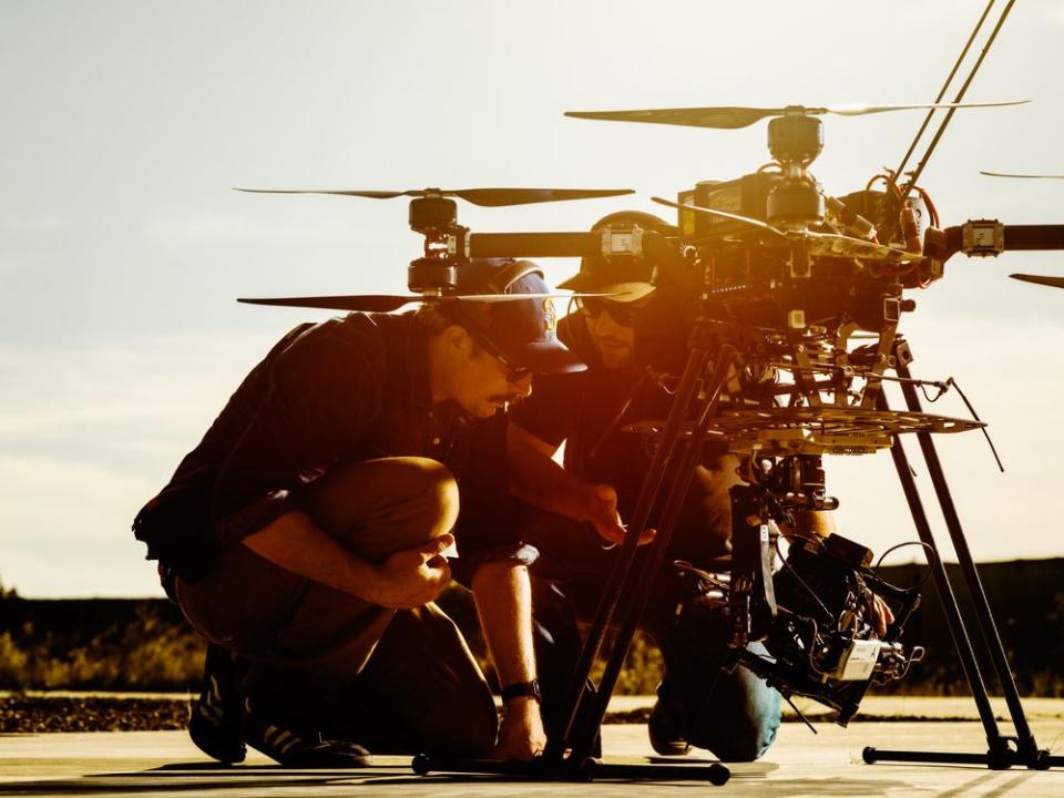 Second Pilot Travis Samson and Pilot in Command Corey Gineris from Astraeus Aerial inspect the “Big Drone” used to shoot the cover video and image.