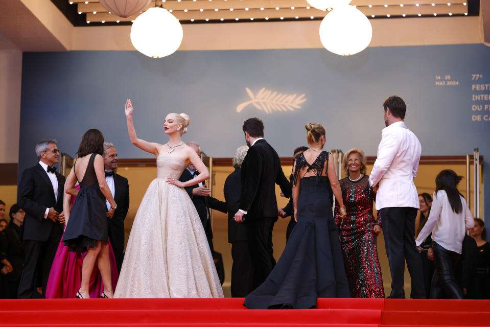 Anya Taylor-Joy waves to onlookers upon arrival at the premiere of the film 'Furiosa: A Mad Max Saga' at the 77th international film festival, Cannes, southern France, Wednesday, May 15, 2024. (Photo by Vianney Le Caer/Invision/AP)