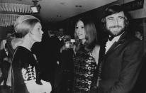 <b>On Her Majesty’s Secret Service – 1969</b><br><br> The Duchess Of Kent, Diana Rigg and Bond actor George Lazenby meet at the premiere for ‘On Her Majesty’s Secret Service’. <br><br> (Copyright: REX)