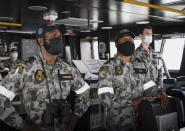 In this photo provided by the Australia Defense Force, crew of HMAS Adelaide prepare Wednesday, Jan. 19, 2022, before departing the port of Brisbane, Australia, to provide humanitarian assistance to the Government of Tonga. U.N. humanitarian officials report that about 84,000 people — more than 80% of Tonga's population — have been impacted by the volcano's eruption. (LSIS David Cox/Australian Defence Force via AP)