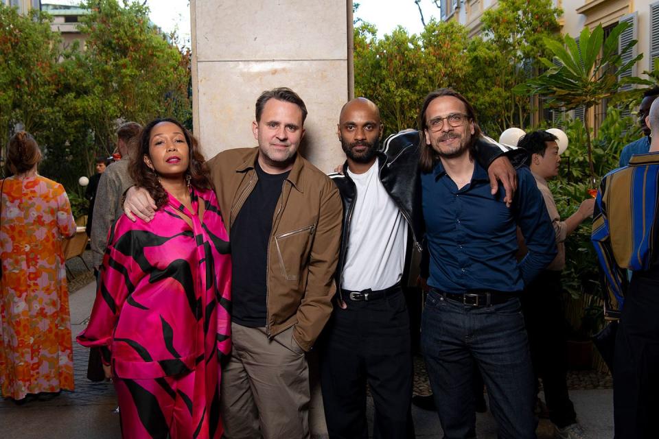 a group of people posing for a photo