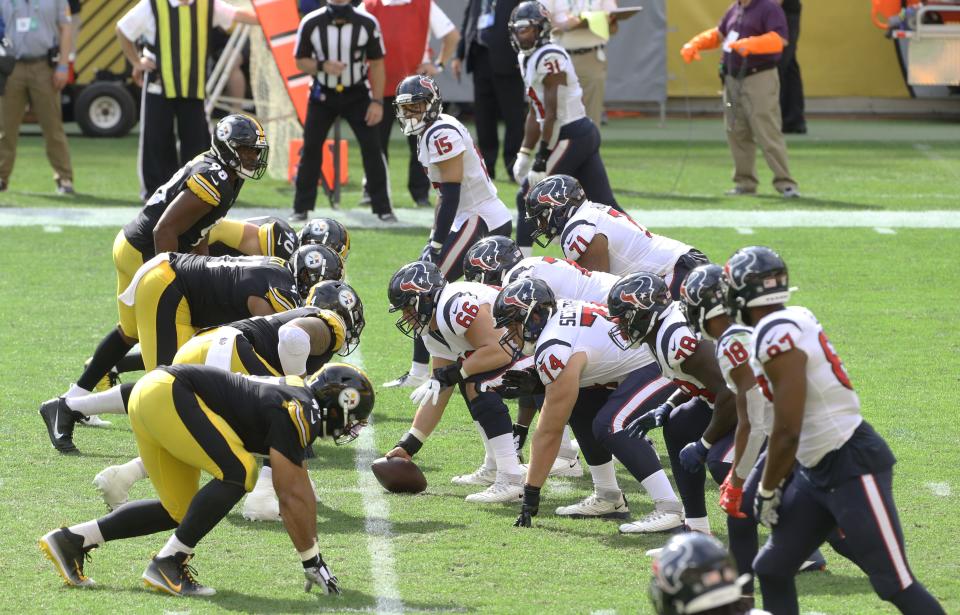 The Pittsburgh Steelers defense lines up against the Houston Texans offense during the third quarter at Heinz Field. The Steelers won 28-21.
