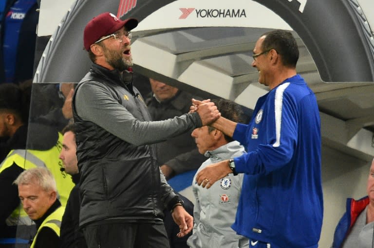 Chelsea manager Maurizio Sarri (right) enjoyed his battle with Liverpool's Jurgen Klopp