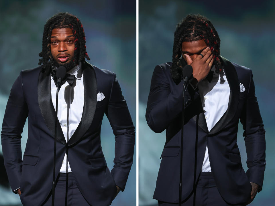 Damar Hamlin of the Buffalo Bills presents the Pat Tillman Award for Service to the trainers of the Bills at the ESPY awards in Los Angeles on Wednesday. (ABC)