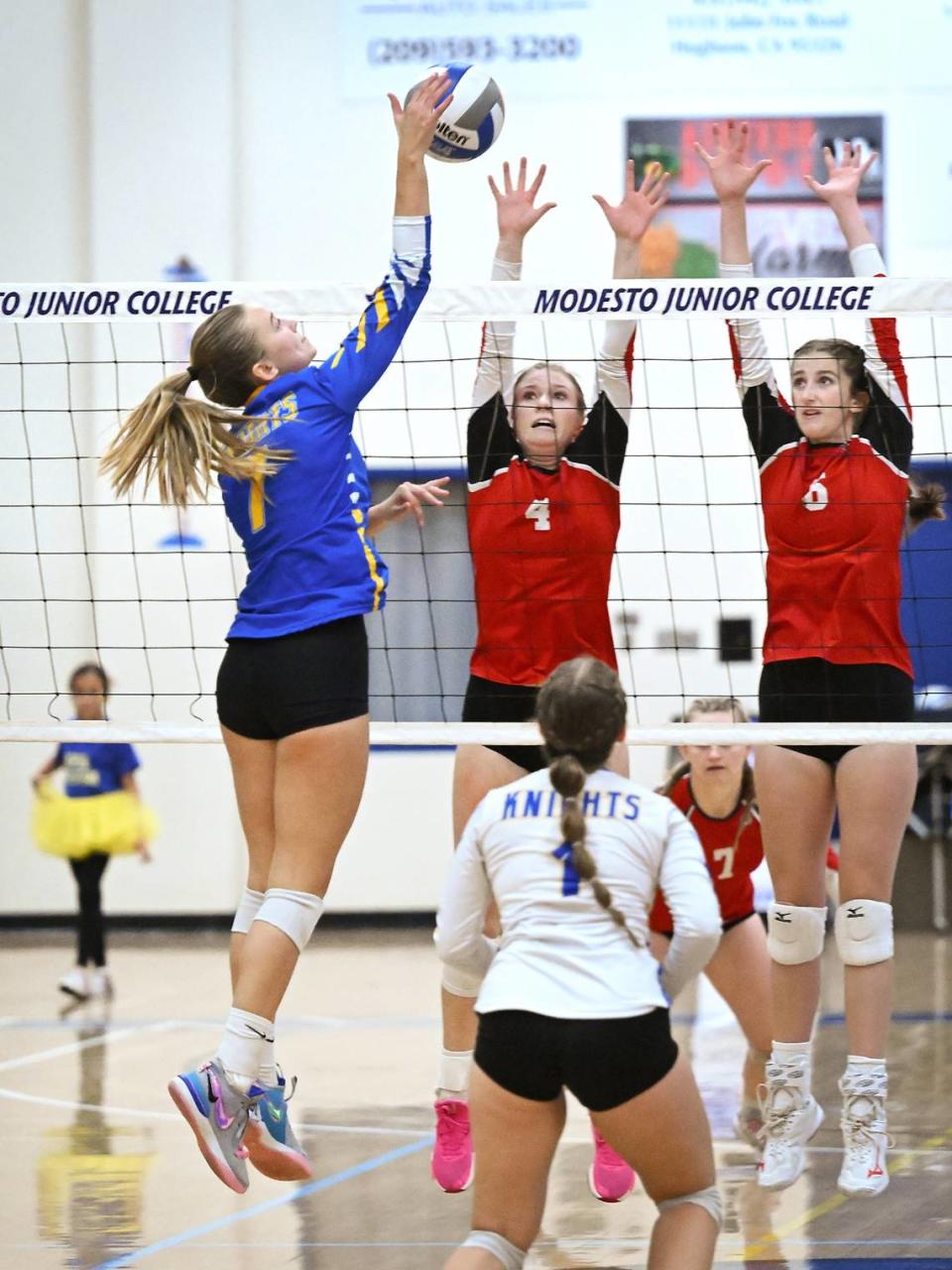 Ripon Christian’s Jordan Vander Veen spikes the ball as Ripon’s Katelyn Bogetti (4) and Olivia Neuman (6) defend during the Sac-Joaquin Section Division IV championship match at Modesto Junior College in Modesto, Calif., Saturday, Nov. 4, 2023. Ripon Christian won the match 3-0. Andy Alfaro/aalfaro@modbee.com