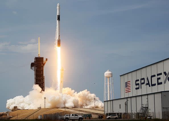 CAPE CANAVERAL, FLORIDA - MAY 30: The SpaceX Falcon 9 rocket with the manned Crew Dragon spacecraft attached takes off from launch pad 39A at the Kennedy Space Center on May 30, 2020 in Cape Canaveral, Florida. NASA astronauts Bob Behnken and Doug Hurley lifted off today on an inaugural flight and will be the first people since the end of the Space Shuttle program in 2011 to be launched into space from the United States. (Photo by Joe Raedle/Getty Images)