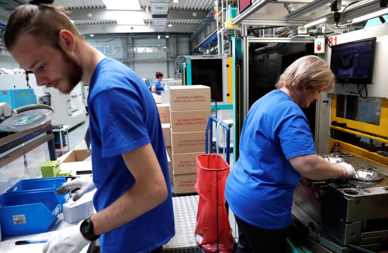 Employees work at the Simon Manufacturer of Plastic Products in Koszarhegy