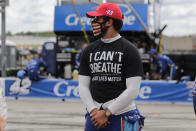 Bubba Wallace (43) wears a "I Can't Breath, Black Lives Matter" shirt before a NASCAR Cup Series auto race at Atlanta Motor Speedway, Sunday, June 7, 2020, in Hampton, Ga. (AP Photo/Brynn Anderson)