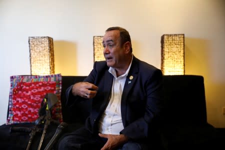 The winner of Guatemala's presidential election, Alejandro Giammattei, talks during an interview with Reuters in Guatemala City,