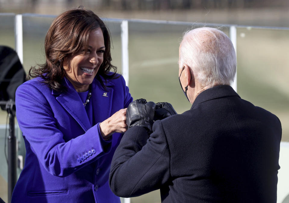 Vice President Kamala Harris bumps fists with President-elect Joe Biden after she was sworn in during the inauguration, Wednesday, Jan. 20, 2021, at the U.S. Capitol in Washington. (Jonathan Ernst/Pool Photo via AP)