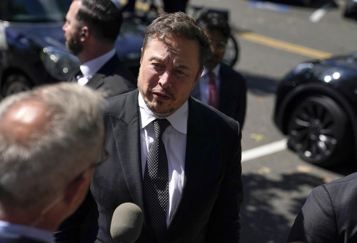 WASHINGTON, DC - SEPTEMBER 13: Elon Musk, CEO of Tesla and X, speaks to reporters as he leaves the “AI Insight Forum” at the Russell Senate Office Building on Capitol Hill on September 13, 2023 in Washington, DC. Lawmakers are seeking input from business leaders in the artificial intelligence sector, and some of their most ardent opponents, for writing legislation governing the rapidly evolving technology. (Photo by Nathan Howard/Getty Images)