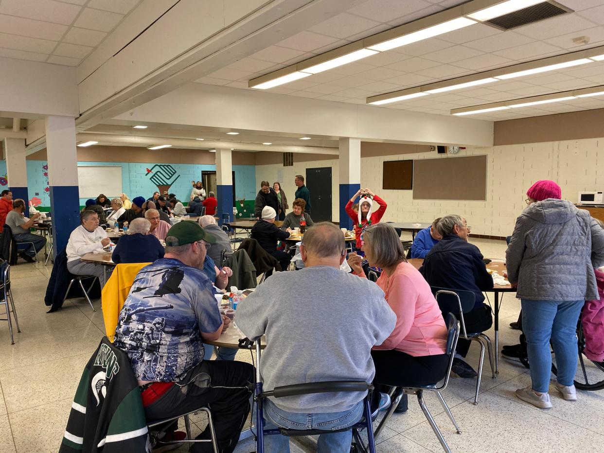 Guests enjoy the Thanksgiving dinner provided by the Adrian Kiwanis Club, Alpha Koney Island and the Adrian Public Schools on Thanksgiving Day, Nov. 28, 2019, at what is now Drager Early Learning Center in Adrian.
