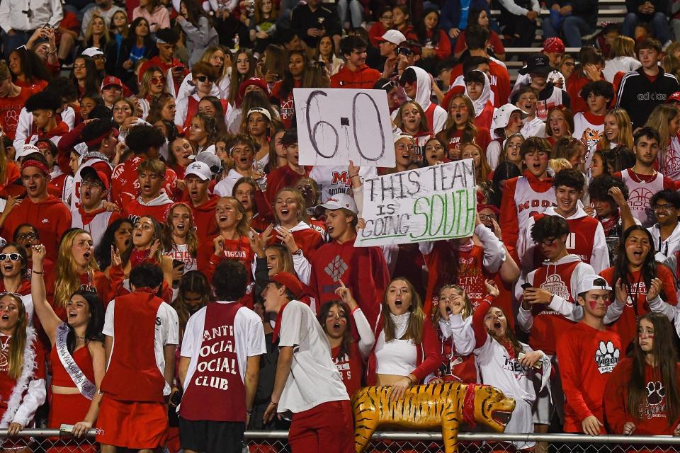 The Moon Tigers student section cheer on the Tigers in the final seconds of the game against the South Fayette Lions at Tiger Stadium on October 1, 2021 in Moon Township. Justin Berl/For The Times