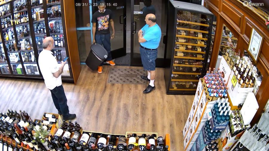 Security video captured a thief escaping with a $1,000 bottle of liquor during a violent confrontation at a liquor store in Calabasas on Aug. 31, 2023. (Malibu Liquor and Wine)