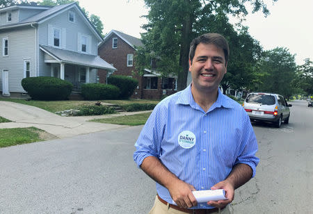 Democratic candidate Danny O'Connor canvasses voters, in Ohio's 12th congressional district, ahead of a special election in Mansfield, Ohio, U.S., July 15, 2018. Picture taken July 15, 2018. REUTERS/Tim Reid