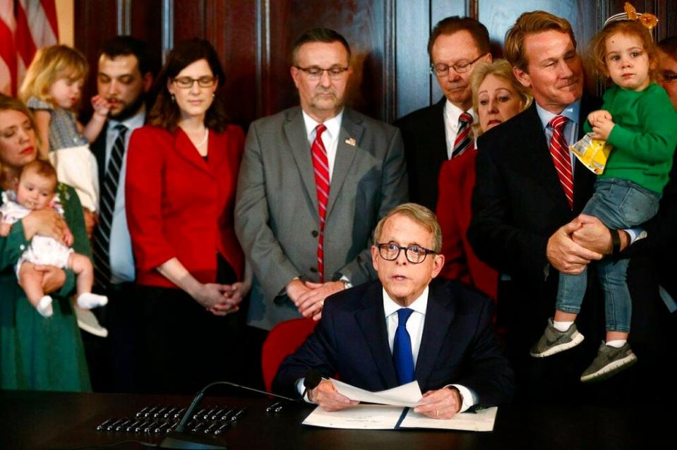 Gov. Mike DeWine speaks before signing a bill imposing one of the nation's toughest abortion restrictions on April 11, 2019 in Columbus.