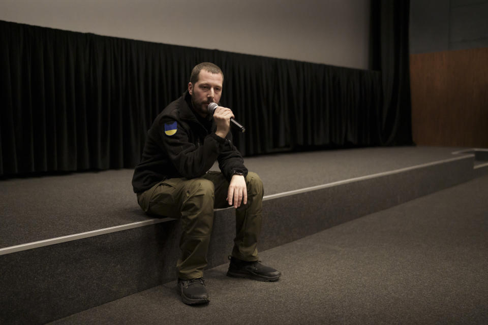 The Associated Press journalist and film director Mstyslav Chernov speaks to the audience during the Q&A during the Ukrainian premiere of his documentary film "20 Days in Mariupol" in Kyiv, Ukraine, Saturday, June 3, 2023. (AP Photo/Roman Hrytsyna)