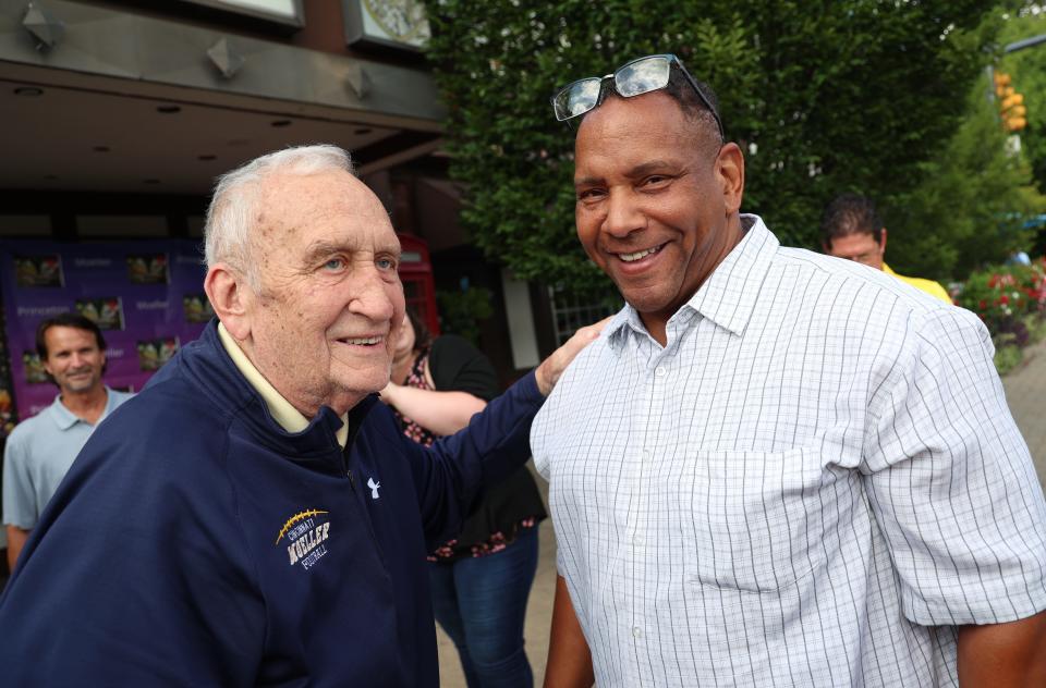 Former Moeller head coach Gerry Faust joins former player Hiawatha Francisco at the premiere of the "King of the Block"  documentary at the Mariemont Theatre Wednesday, Aug. 10, 2022.