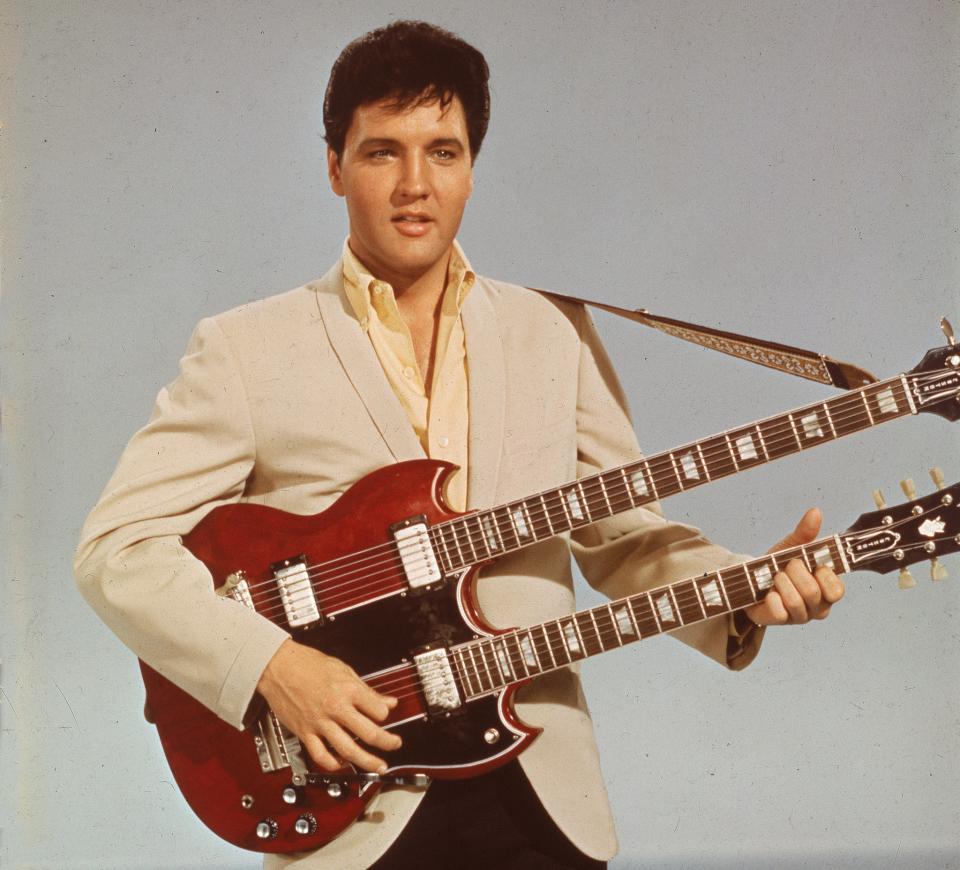 Elvis Presley photographed in 1955Getty Images