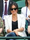<p>The Duchess of Sussex cheers on her friend Serena Williams while wearing a casual blazer and jeans.</p>