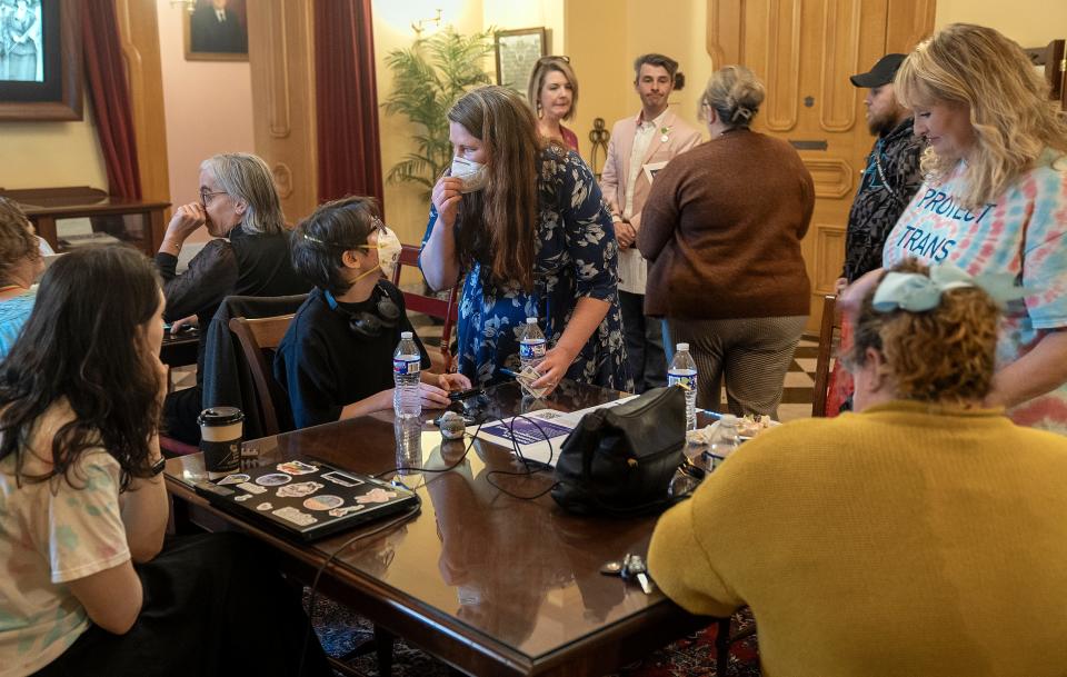 Parker Elswick, 16, speaks with his mother Betty Elswick, both of Marysville, during a gathering before the Ohio House voted to override Gov. Mike DeWine's veto of House Bill 68 on Wednesday.