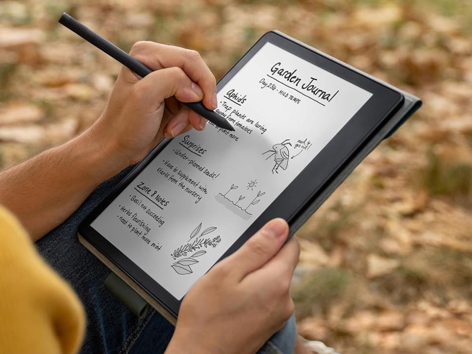 Kindle Scribe in use.