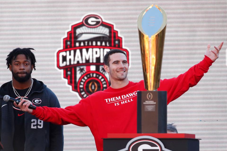 Georgia quarterback Stetson Bennett celebrates during Georgia's back to back National Championship celebration in Athens, Ga., on Saturday, Jan. 14, 2023.