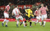 Britain Football Soccer - Stoke City v Watford - Premier League - bet365 Stadium - 3/1/17 Watford's Odion Ighalo in action with Stoke City's Bruno Martins Indi (L), Erik Pieters (2nd L), Joe Allen (2nd R) and Ryan Shawcross Reuters / Darren Staples Livepic