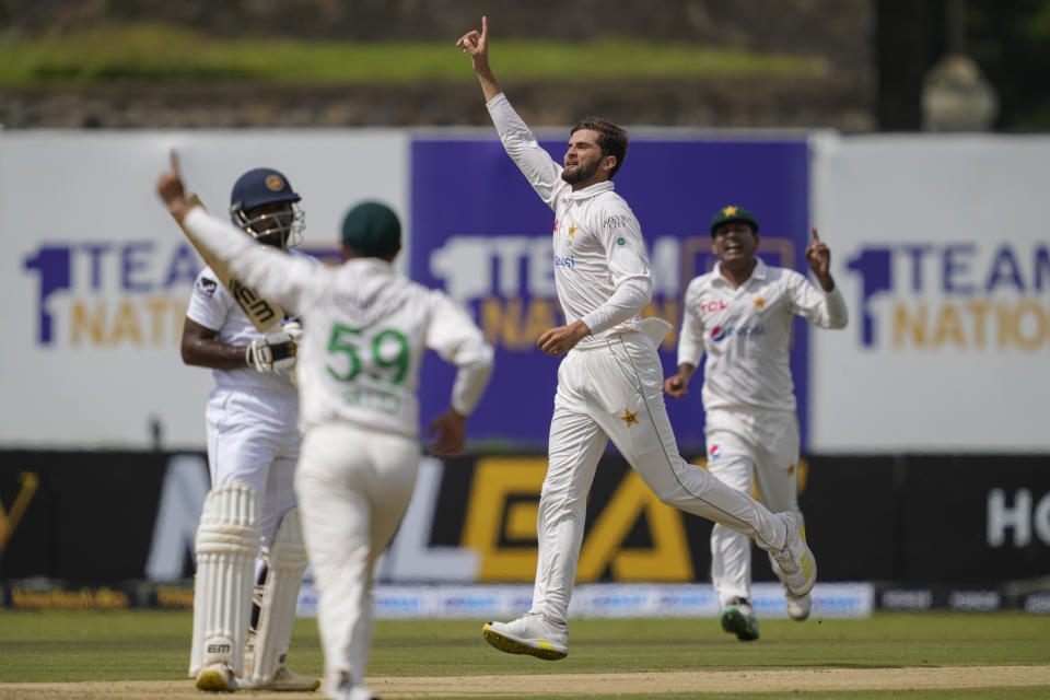 Pakistan's Shaheen Shah Afridi, second right, celebrates taking the wicket of Sri Lanka's Nishan Madushka during the day one of the first test cricket match between Sri Lanka and Pakistan in Galle, Sri Lanka on Sunday, July 16, 2023. (AP Photo/Eranga Jayawardena)