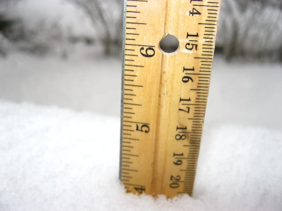 Snowfall totals are provided by the National Weather Service.