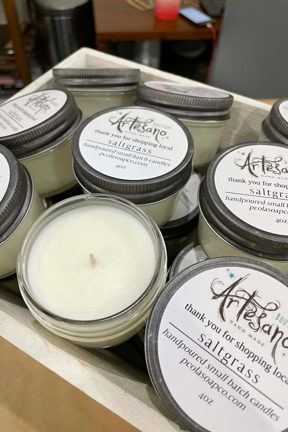 As a thank you to its customers, Artesano Boutique in downtown Fort Walton Beach will give away these handmade candles with purchases during the Small Business Saturday shopping weekend. The shop carries works by about 50 artists, many of them from the Florida Panhandle.