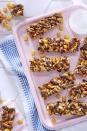 <p>Turn your favorite childhood cereal into a salty, sweet and crunchy bar that's perfect for packing as a snack!</p><p><em><a href="https://www.countryliving.com/food-drinks/recipes/a46344/peanutty-capn-crunch-candy-bars-recipe/" rel="nofollow noopener" target="_blank" data-ylk="slk:Get the recipe from Country Living »;elm:context_link;itc:0;sec:content-canvas" class="link ">Get the recipe from Country Living »</a></em></p>