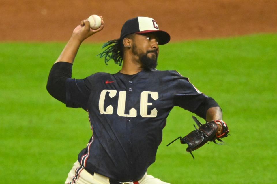 Cleveland Guardians relief pitcher Emmanuel Clase (48) delivers a pitch in the ninth inning against the Minnesota Twins on May 17 in Cleveland.