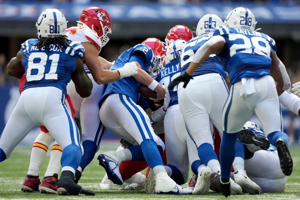 Indianapolis Colts quarterback Matt Ryan (2) rushes the ball for first down Sunday, Sept. 25, 2022, during a game against the Kansas City Chiefs at Lucas Oil Stadium in Indianapolis.