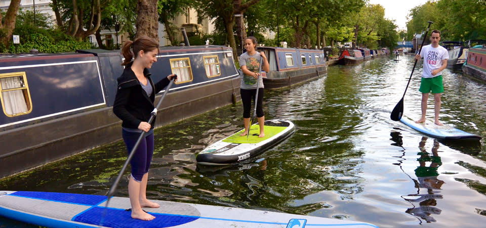 Stand-up paddle boarding on the Thames, West London