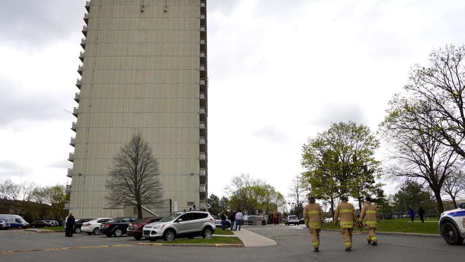 Emergency crews respond to a fire in a highrise at the east end of Donald Street on May 2, 2024. A man is facing nine charges related to it, including attempted murder and arson endangering life.