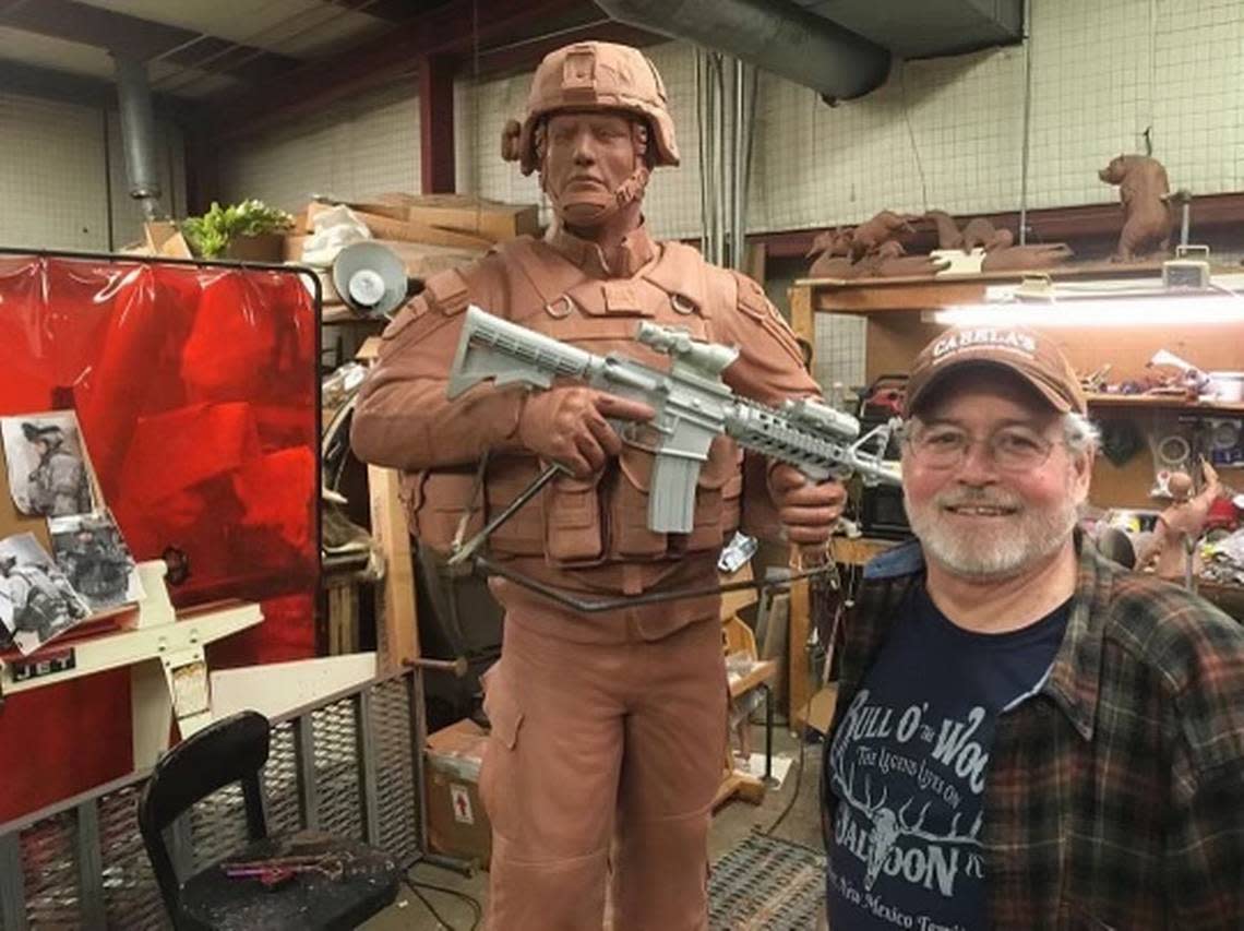 Parsons pictured with one of his life-size bronze sculptures. His wife says he closed down to his full-time taxidermy business in 2012 to focus on bronze sculpting.