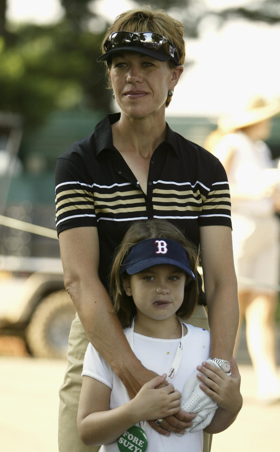 Suzy Whaley stands with her daughter Jennifer before she tees off at the start of the second round of the Greater Hartford Open on July 25, 2003 at TPC at River Highlands in Cromwell, Connecticut. (Photo by Elsa/Getty Images)