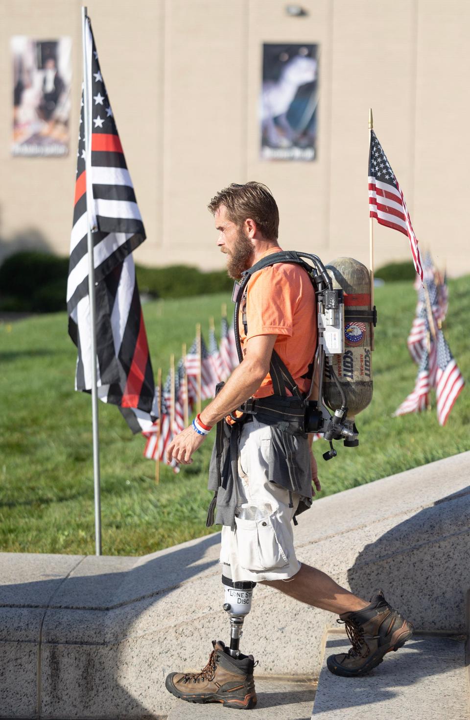 Christopher Young of Plain Township takes part in the 9/11 Memorial Stair Climb held at the McKinley National Memorial on Monday in Canton.