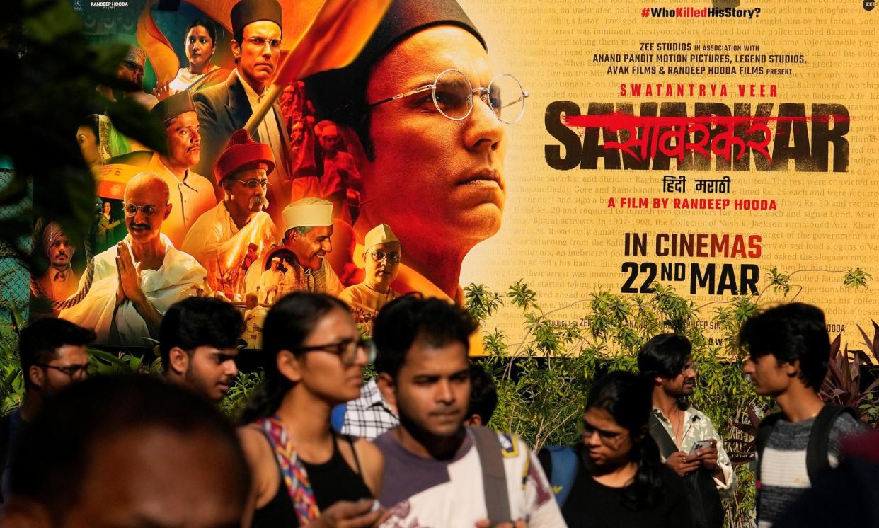 <span>A poster for the film Swatantra Veer Savarkar outside a cinema in Mumbai.</span><span>Photograph: Rajanish Kakade/AP</span>