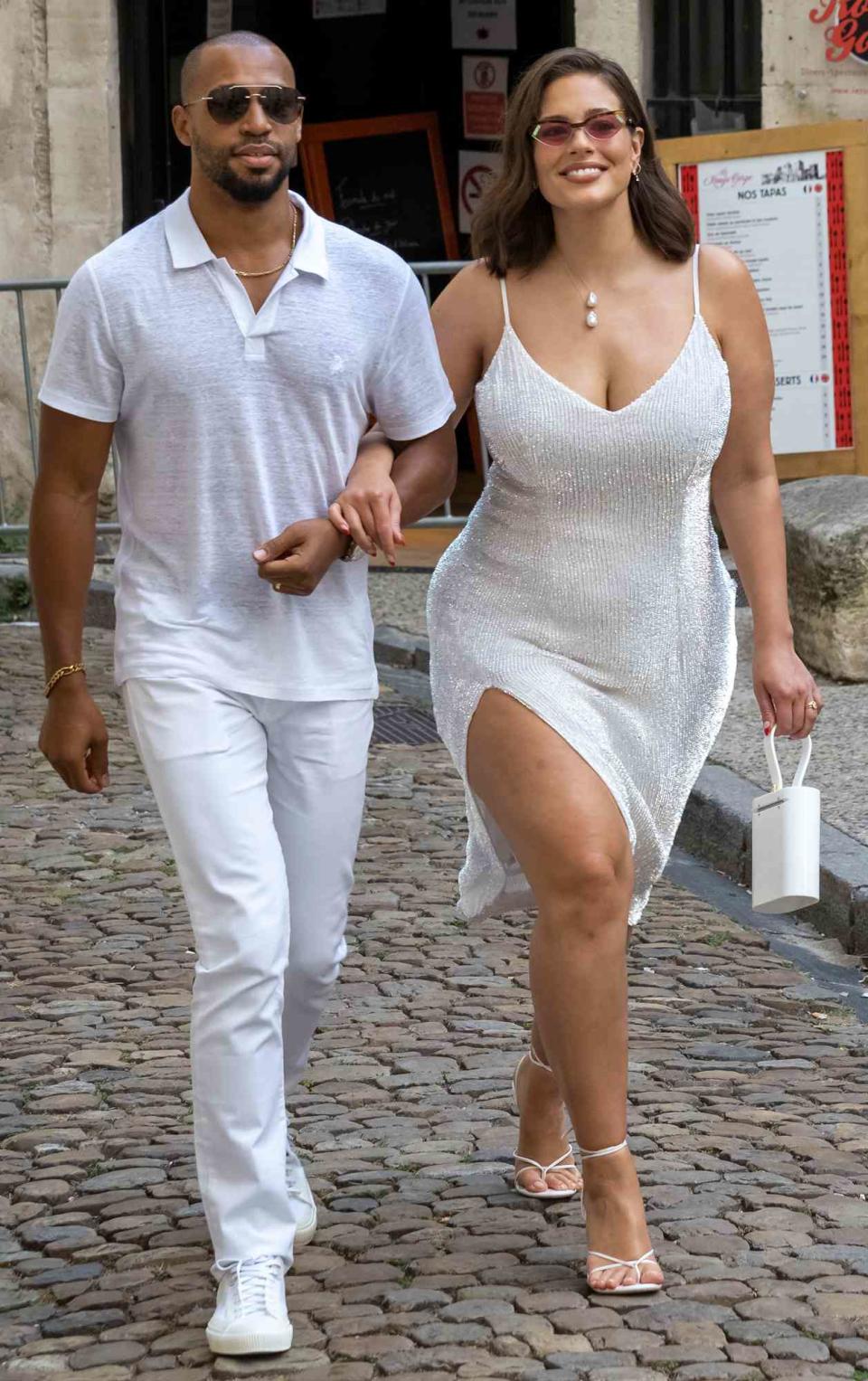 Ashley Graham and husband Justin Ervin arrives at the Hotel de la Mirande for a white dinner before the wedding of Sophie Turner and Joe Jonas on June 28, 2019 in Avignon, France