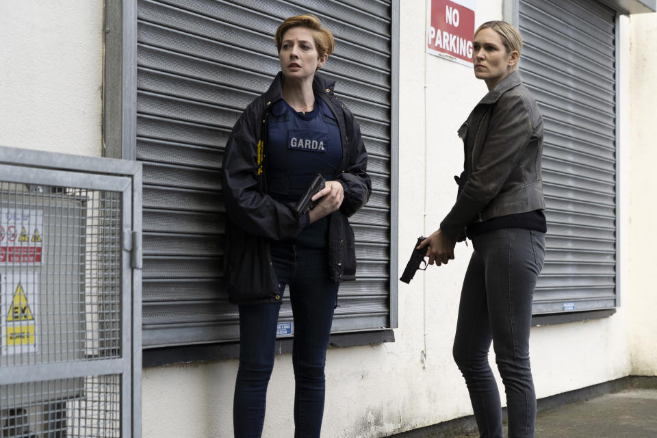 This image released by Acorn TV shows Orla Fitzgerald, left, and Lynn Rafferty in a scene from "Taken Down," premiering on Monday, Sept. 16. (Bernard Walsh/Acorn TV via AP)