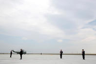 <p>Secret Service officers stand as President Obama leaves for his Hiroshima trip at Chubu Centrair International Airport in Tokoname, Japan, May 27, 2016. (Reuters/Carlos Barria) </p>