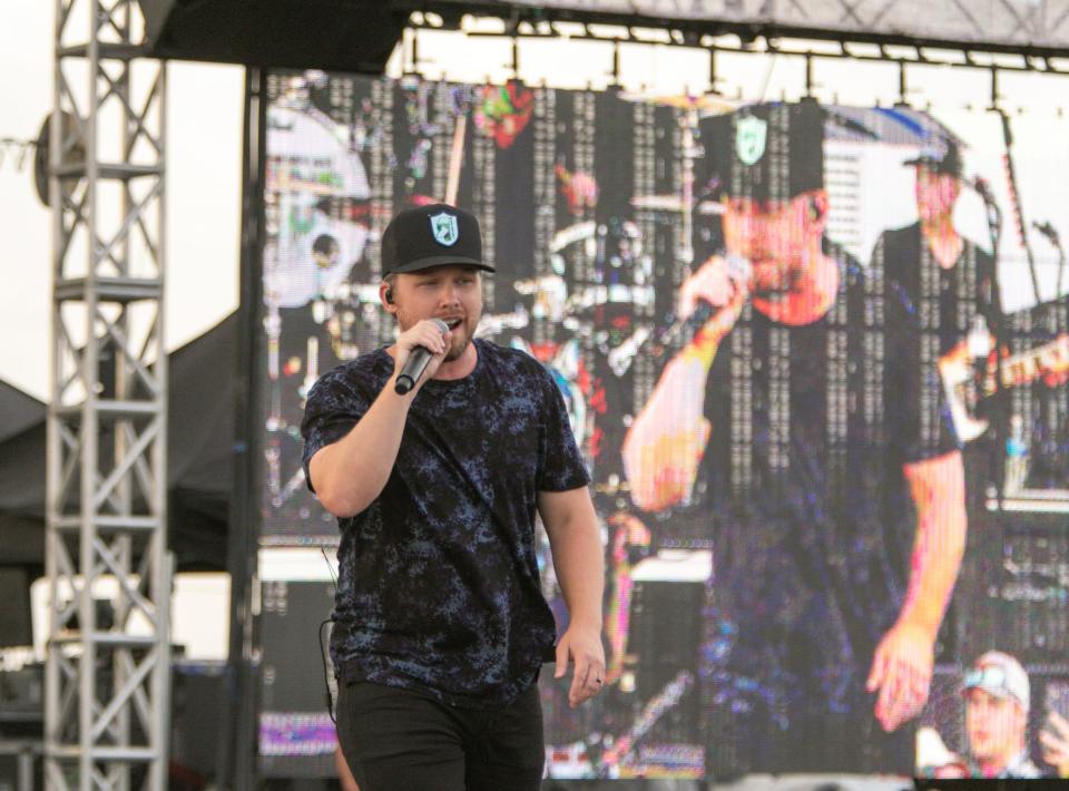 Jameson Rodgers sings in the first act of the Luke Bryan Farm Tour concert Saturday, Sept. 17, 2022.