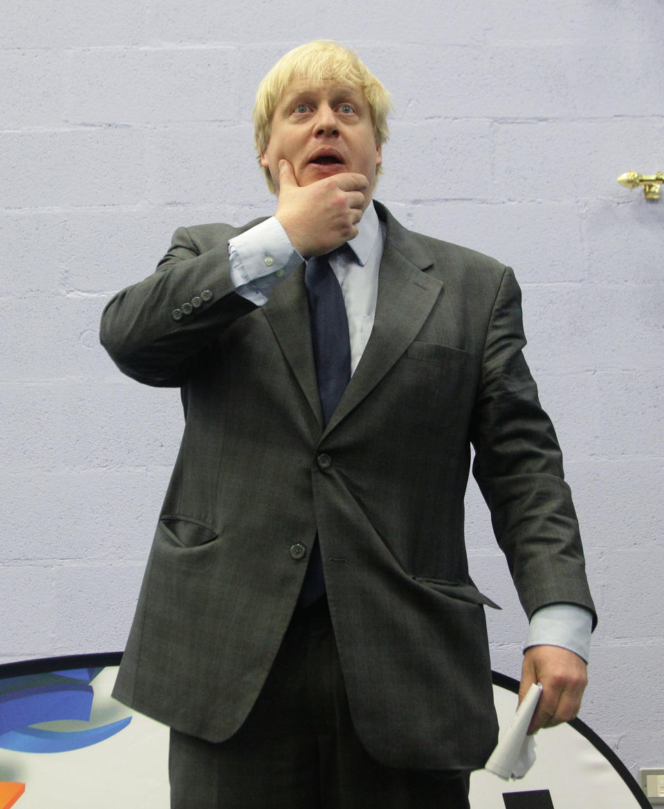 Mayor of London Boris Johnson after unveiling a plaque to mark the official opening of Crown and Manor youth club's new building at Wiltshire Row, north London, during a visit to a 100-year-old youth club that has helped 10,000 boys. PRESS ASSOCIATION Photo. Picture date: Thursday February 28, 2013. Photo credit should read: Yui Mok/PA Wire