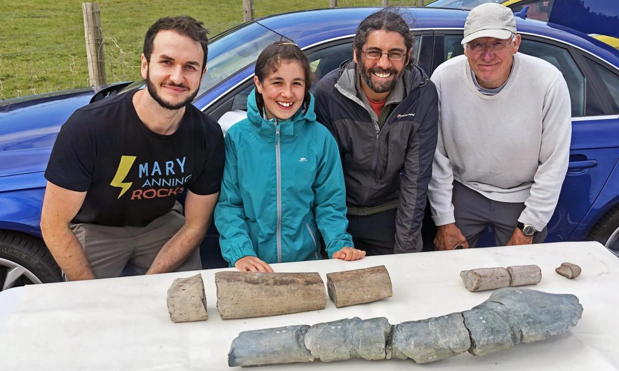 <span>Palaeontologist Dr Dean Lomax (left) with Ruby and Justin Reynolds and Paul de la Salle (right), who found remains that belonged to the same species of ichthyosaur.</span><span>Photograph: Supplied</span>