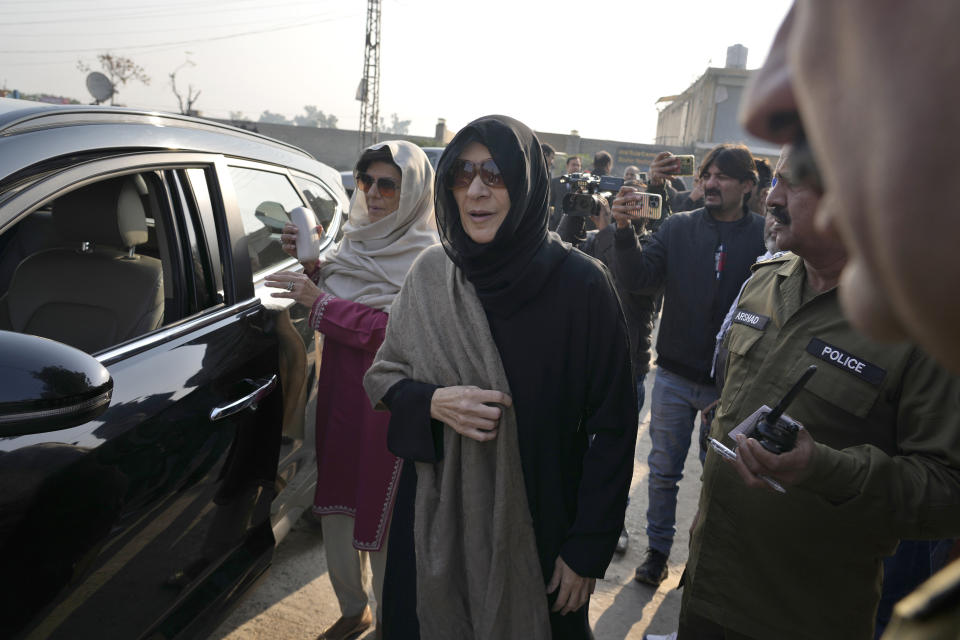 Uzma Khanum, center, and Aleema Khan, left, sisters of Pakistan's former Prime Minister Imran Khan arrives to attend hearing of Cipher case against Khan at a special court in Adiyala prison, in Rawalpindi, Pakistan, Tuesday, Dec. 12, 2023. The trial will determine whether Khan breached the official secrets acts by waving around a confidential diplomatic letter after his ouster through no-confidence in parliament in April 2022. (AP Photo/Anjum Naveed)